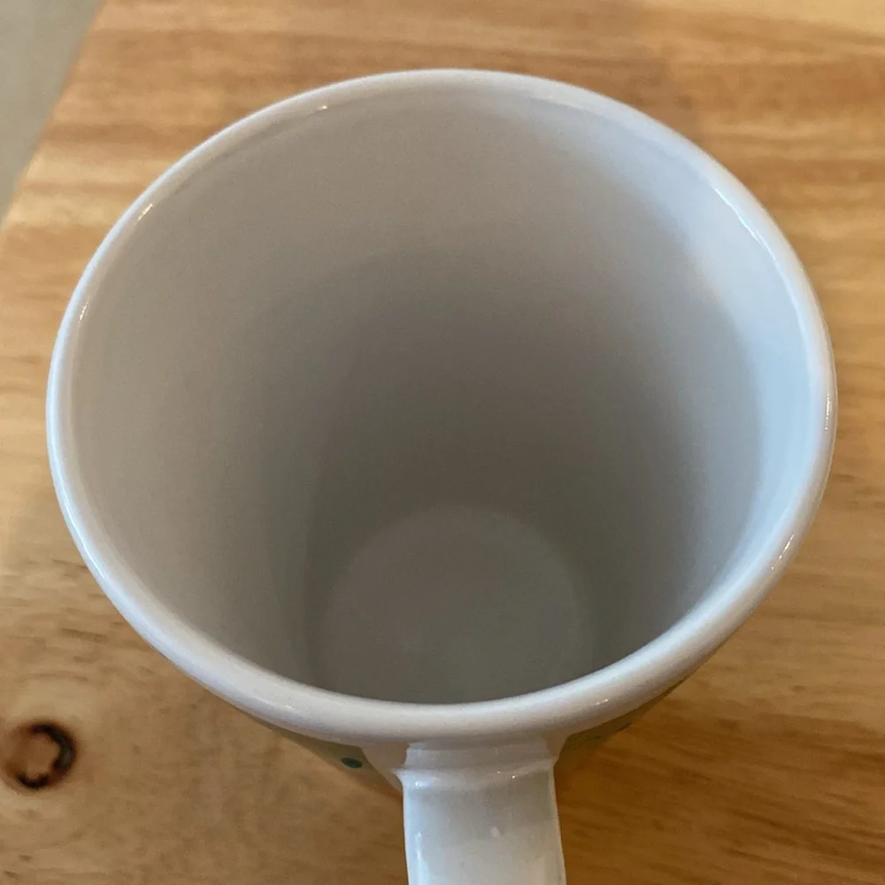 Santa Mug. Holds 8 oz